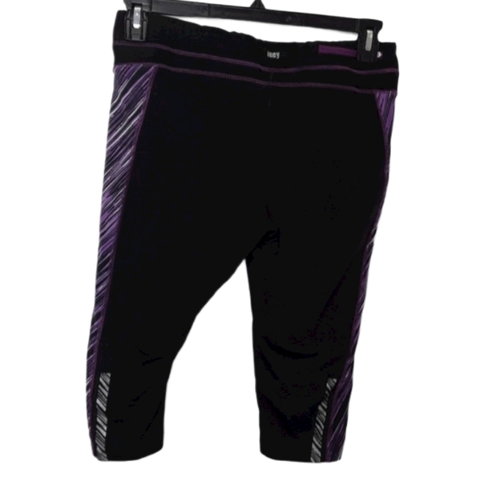 Lucy Tech Black Purple Tiger Stripe Animal Print Capri Leggings EUC sz L